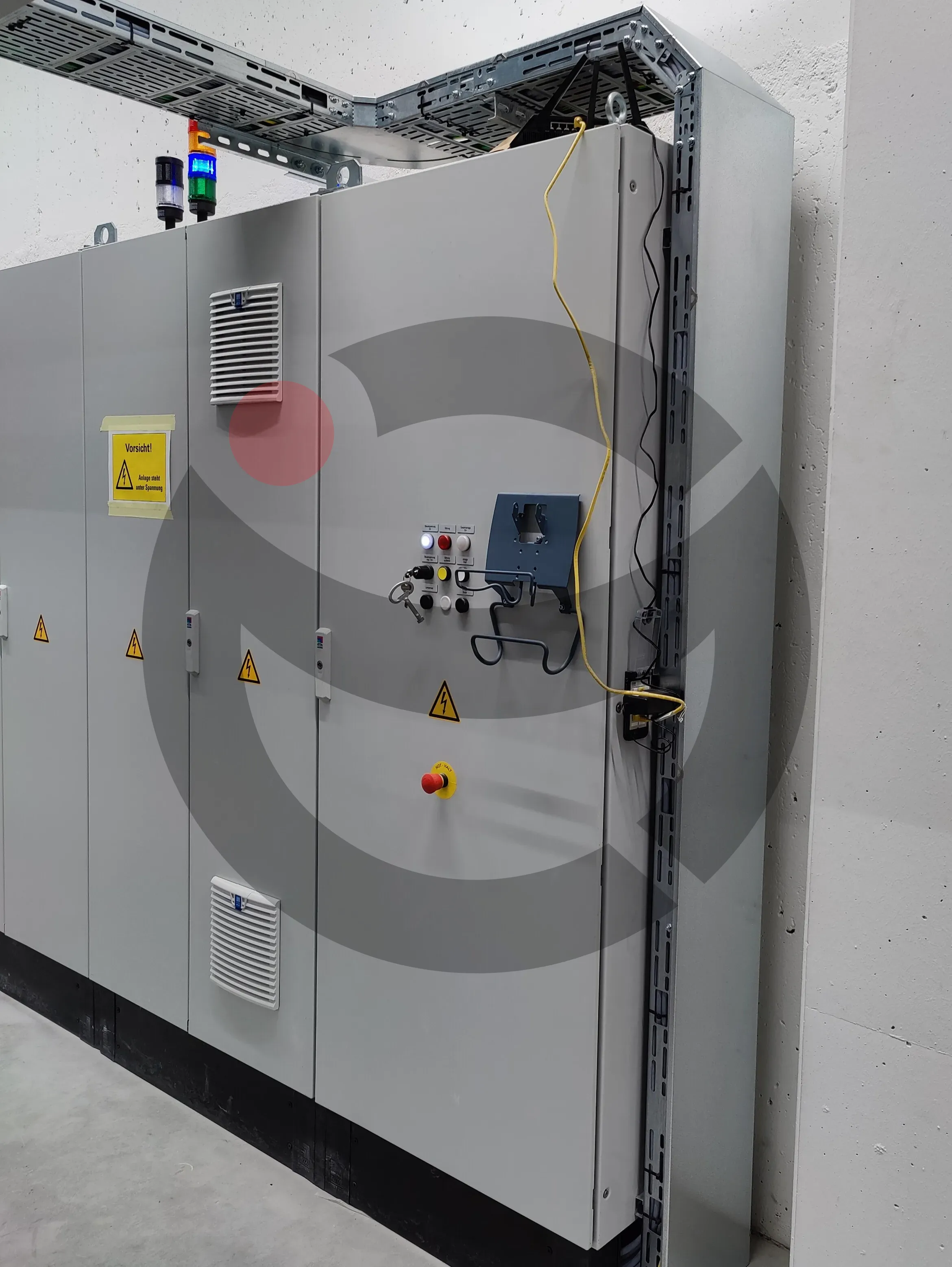 Sheet metal cable risers and control pushbuttons mounted to machinery
