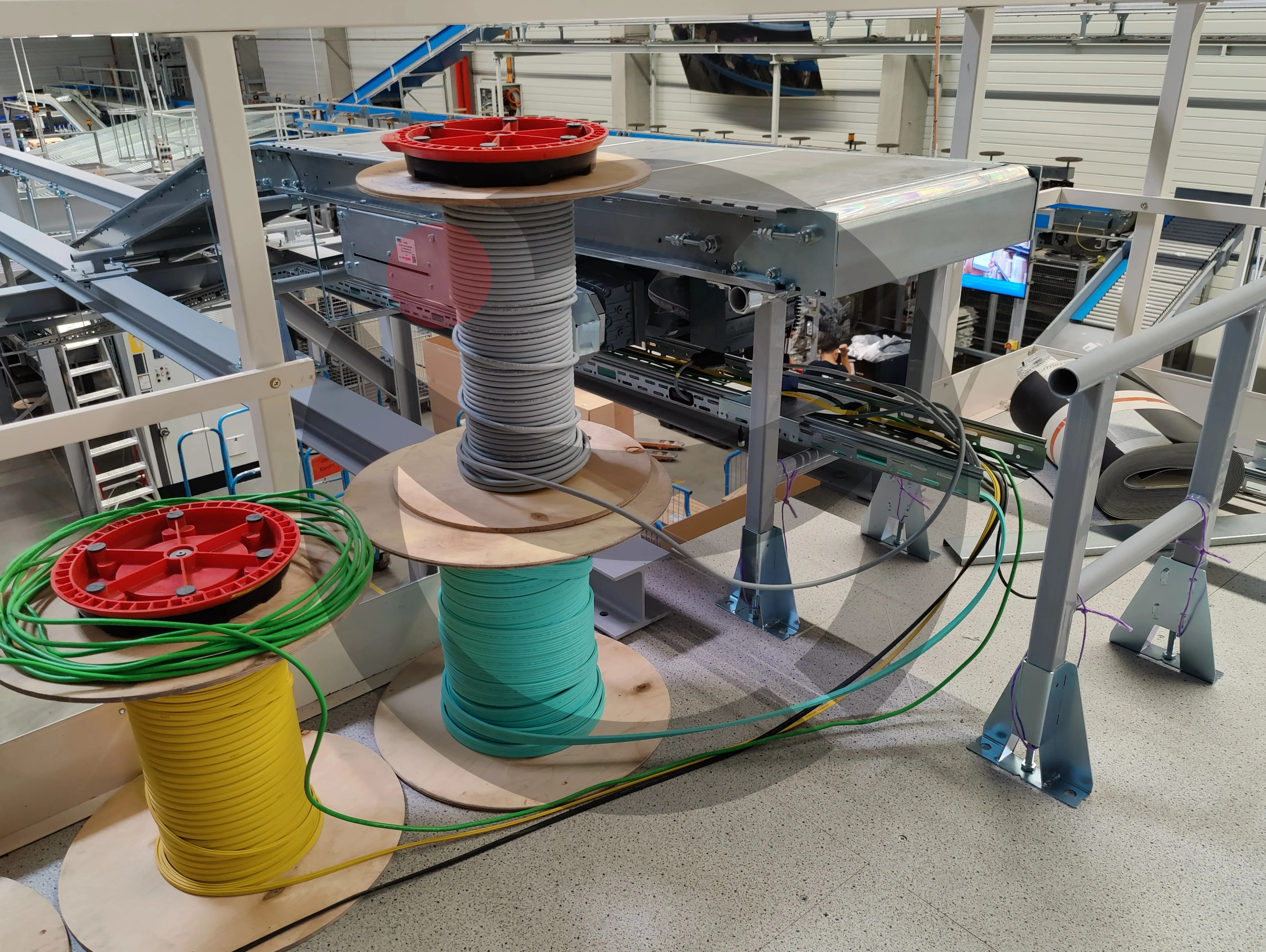 High-volume industrial cable pulling on mezzanine cable trays