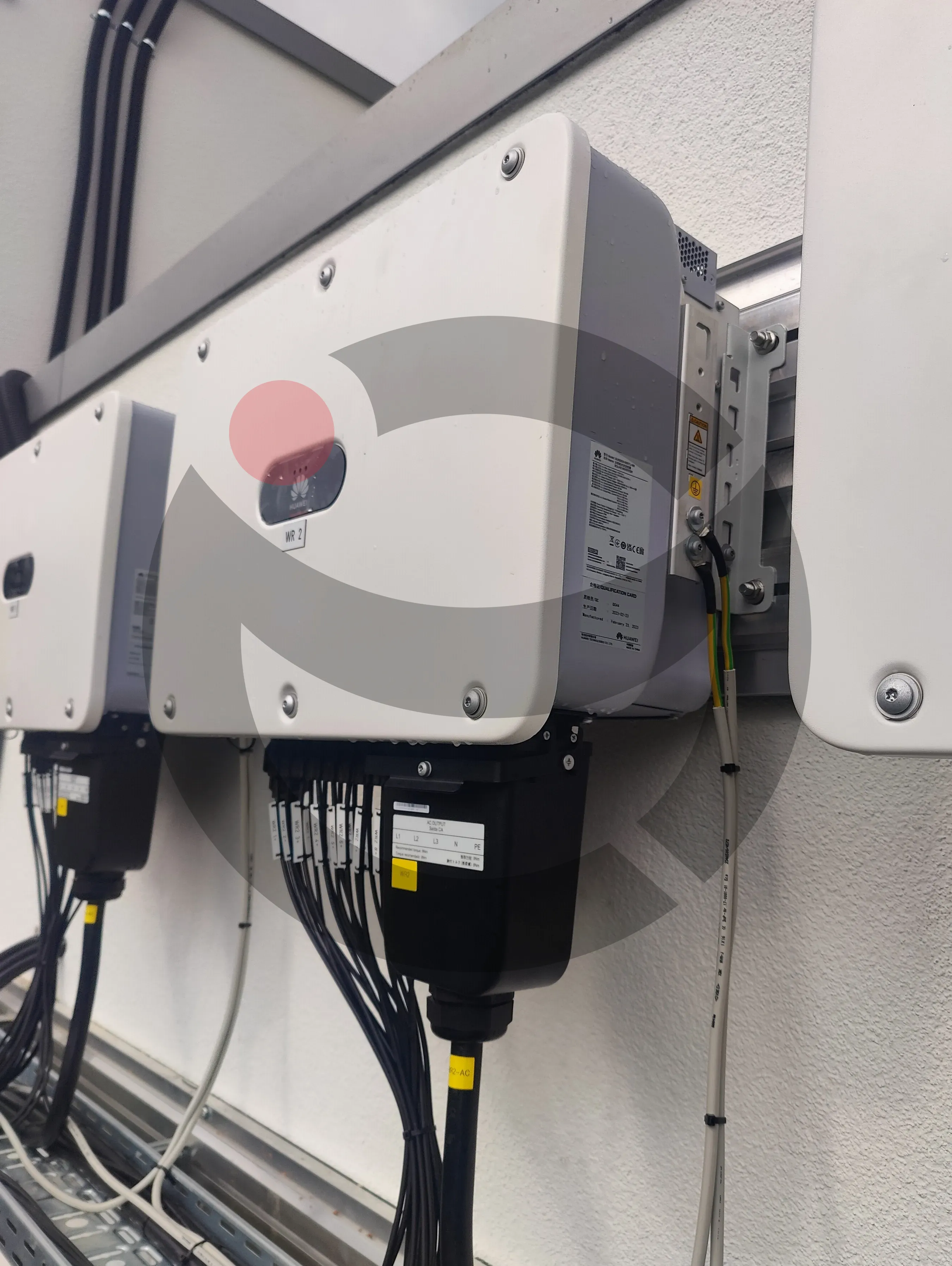 Solar inverter mounting and organized DC string cable termination