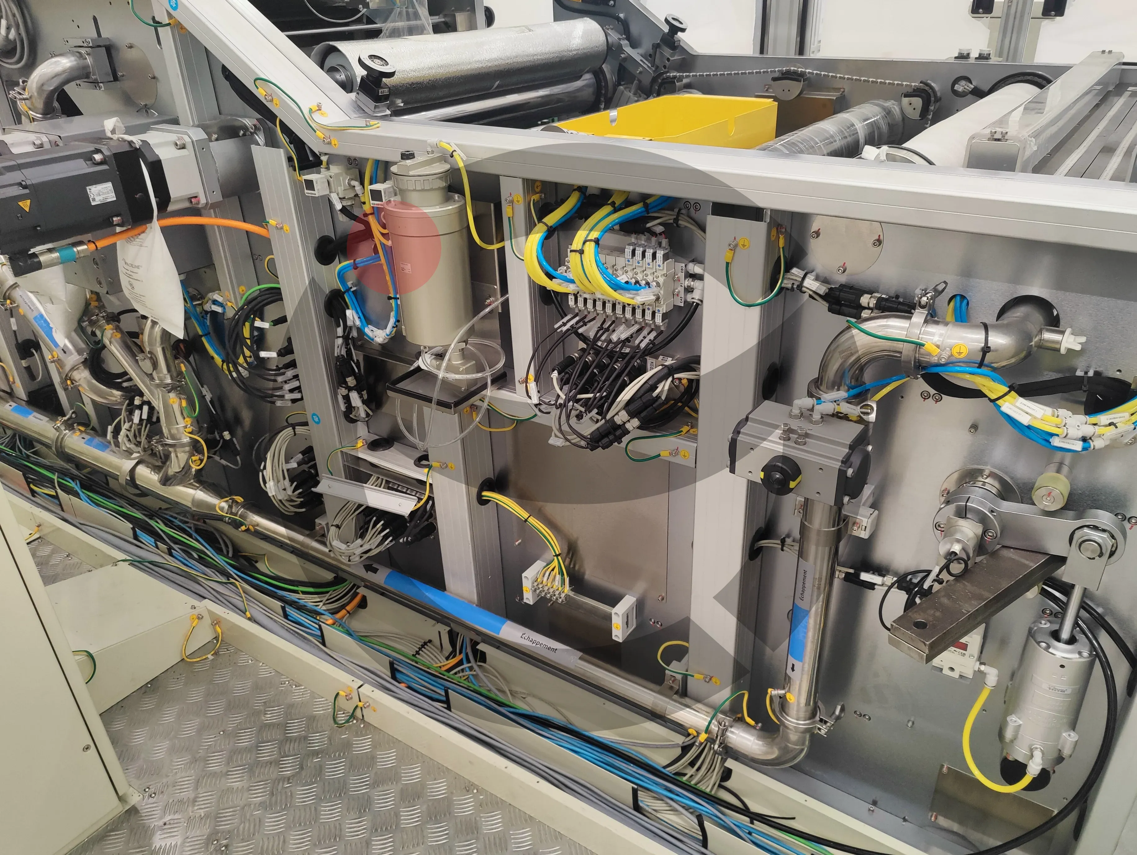Automotive production machinery with Festo valve island and pneumatic tubing